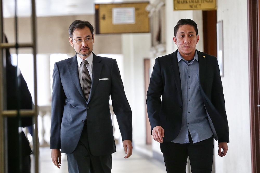 Former 1MDB chief executive officer Datuk Shahrol Azral Ibrahim Halmi (left) arrives at the Kuala Lumpur Courts Complex November 5, 2019. u00e2u20acu201d Picture by Ahmad Zamzahuri