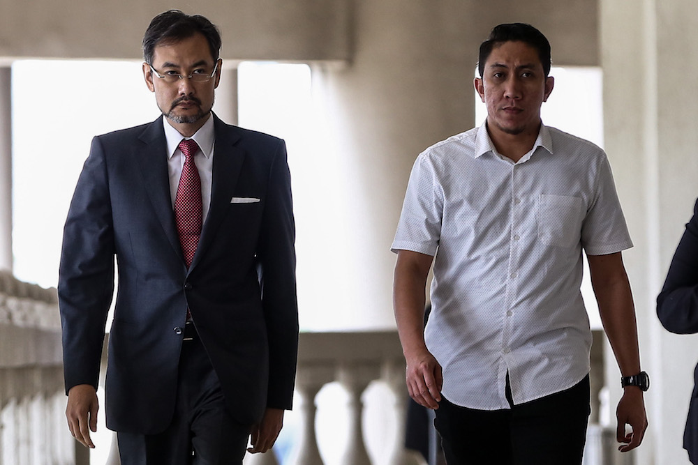 Former 1MDB chief executive officer Datuk Shahrol Azral Ibrahim Halmi (left) arrives at the Kuala Lumpur Courts Complex November 4, 2019. u00e2u20acu201d Picture by Yusof Mat Isa