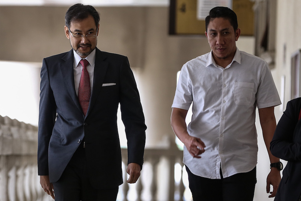 Former 1MDB chief executive officer Datuk Shahrol Azral Ibrahim Halmi (left) arrives at the Kuala Lumpur Courts Complex November 4, 2019. u00e2u20acu201d Picture by Yusof Mat Isa
