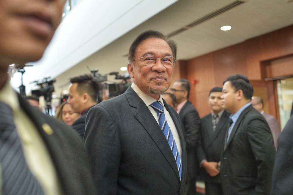 Datuk Seri Anwar Ibrahim leaves after answering media questions at the Parliament building in Kuala Lumpur November 20, 2019. u00e2u20acu201d Picture by Shafwan Zaidon