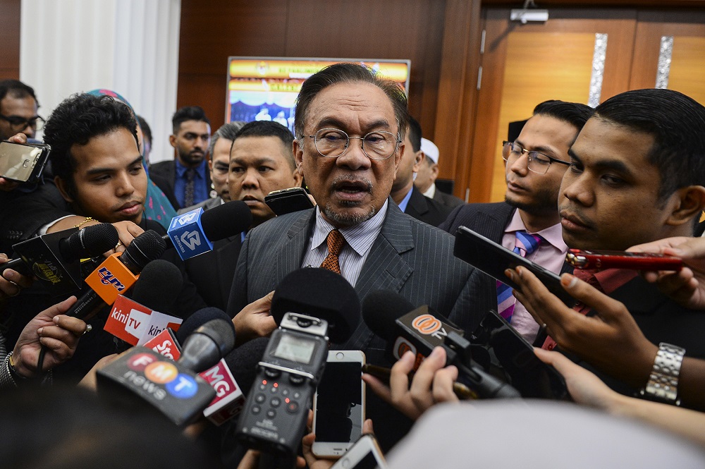 PKR president Datuk Seri Anwar Ibrahim speaks to reporters at the Parliament lobby in Kuala Lumpur November 26, 2019. u00e2u20acu201d Picture by Miera Zulyana