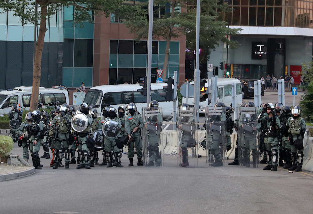 Riot police officers block a street during the 'Lest We Forget' rally in Hong Kong, China December 1, 2019. u00e2u20acu201d Reuters pic
