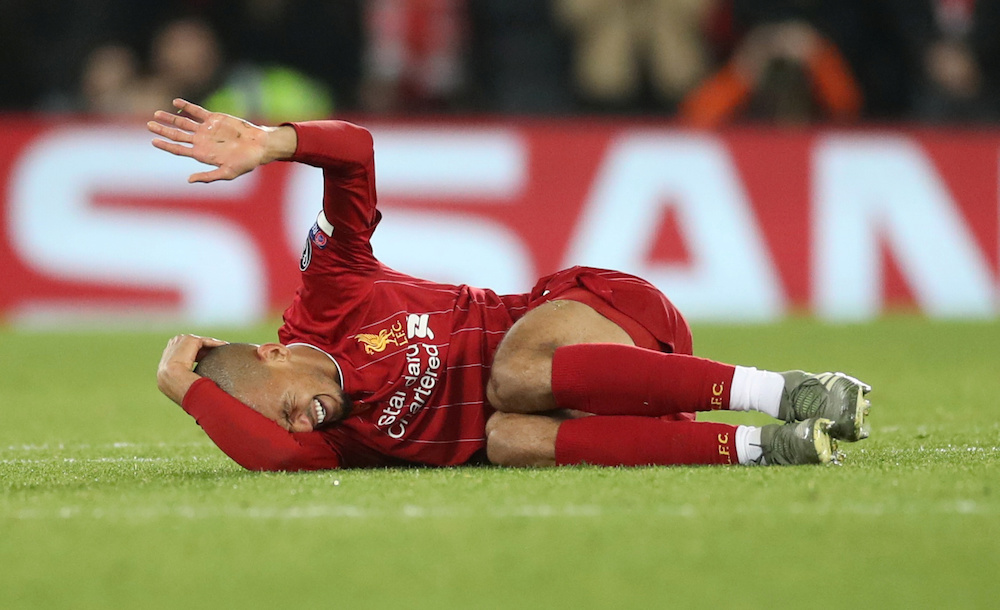 Liverpool's Fabinho reacts after sustaining an injury in their match against Napoli, Anfield November 27, 2019. u00e2u20acu201d Action Images handout via Reuters/Carl Recine 