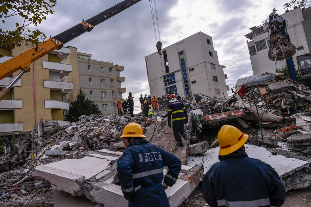 Rescue teams and firefighters search for survivors stuck on a collapsed building in Durres, Albania, November 28, 2019, after the strongest earthquake in decades claimed at least 20 lives, with victims trapped in the debris of toppled buildings. u00e2u20acu201d AFP p