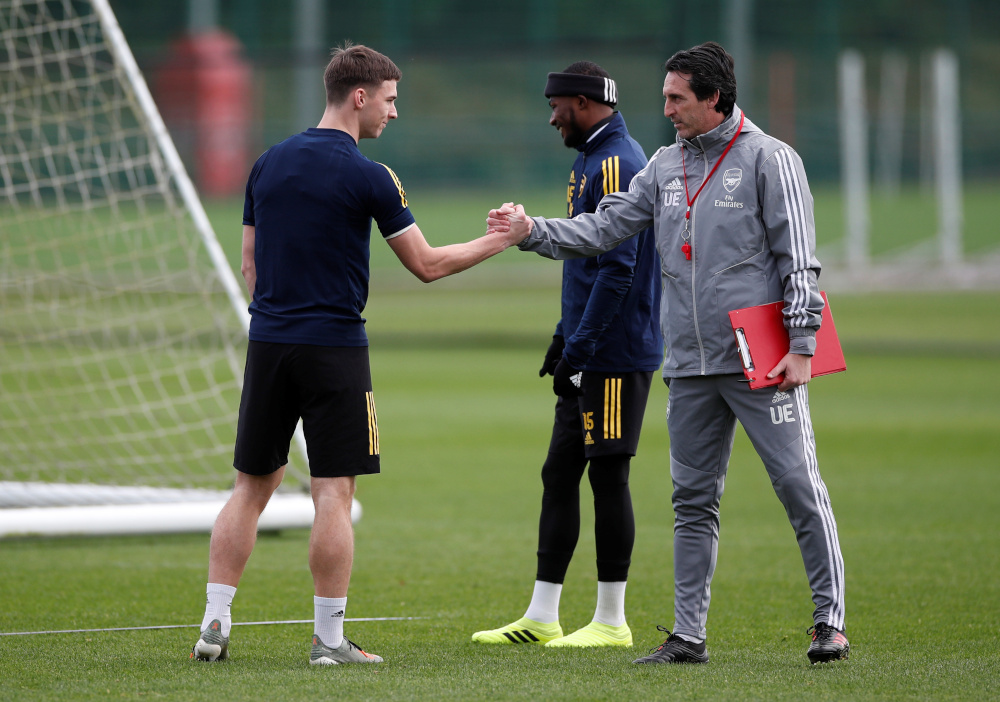 Arsenal manager Unai Emery with Kieran Tierney during training at the Arsenal Training Centre, St Albans, Britain November 27, 2019. u00e2u20acu201d Action Images via Reuters/Paul Childs