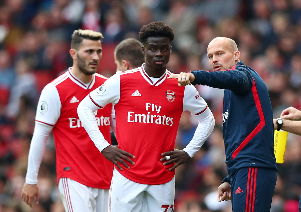 Arsenalu00e2u20acu2122s Bukayo Saka with first-team assistant coach Freddie Ljungberg during the match against Bournemouth at the Emirates Stadium in London, October 6, 2019. u00e2u20acu201d Reuters pic