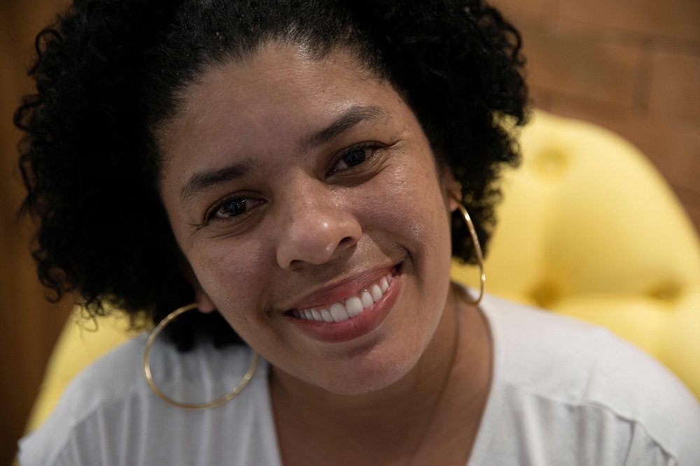 Ana Claudia, 37, smiles as she poses for pictures during an interview with AFP in Rio de Janeiro, Brazil September 9, 2019. — AFP pic