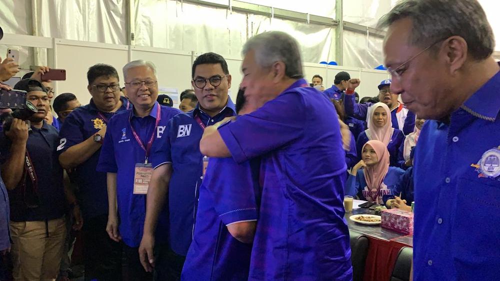 Datou00e2u20acu2122 Seri Dr Ahmad Zahid Hamidi hugs a victorious Jack Seng, November 16, 2019. u00e2u20acu201d Picture by Ben Tannn