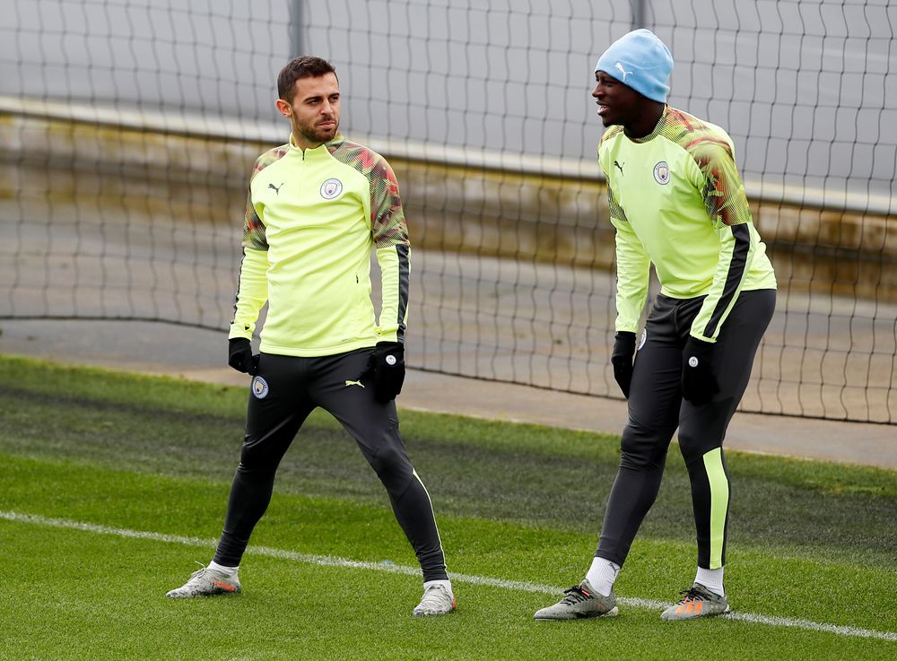 Manchester Cityu00e2u20acu2122s Bernardo Silva and Benjamin Mendy during training at Etihad Campus, Manchester, November 5, 2019. u00e2u20acu201d Action Images via Reuters