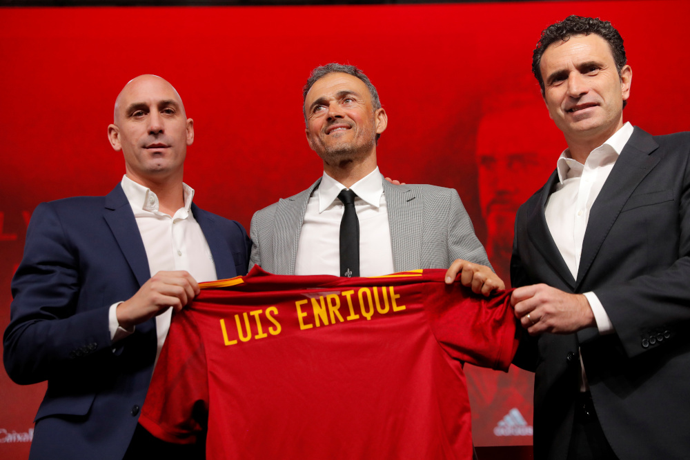 Spanish Football Federation president Luis Rubiales, sporting director Jose Francisco Molina and Spain coach Luis Enrique pose with the shirt during the press conference in Las Rozas, Spain November 27, 2019.  u00e2u20acu201d Reuters pic  