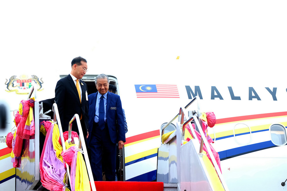 Prime Minister Tun Dr Mahathir Mohamad and his wife Tun Dr Siti Hasmah Mohd Ali (not seen) arrive at Military Air Terminal Two, Wing Six of Don Mueang International Airport in Bangkok November 1, 2019. u00e2u20acu201d Bernama pic