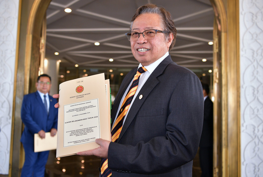 Chief Minister Datuk Patinggi Abang Johari Openg holds a copy of the Sarawak Budget 2020 in Kuching November 4, 2019. u00e2u20acu201d Bernama pic