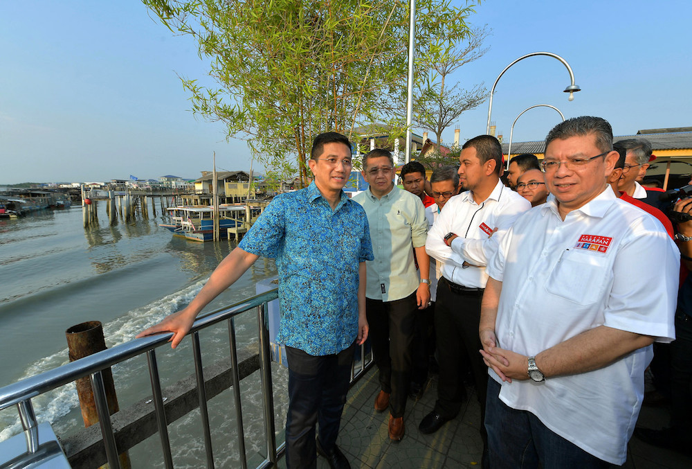 Datuk Seri Azmin Ali, Datuk Saifuddin Abdullah, Datuk Salahuddin Ayub and Datuk Dr Sahruddin Jamal enjoy the scenery in Pulau Kukup, Pontian November 10, 2019. u00e2u20acu201d Bernama pic