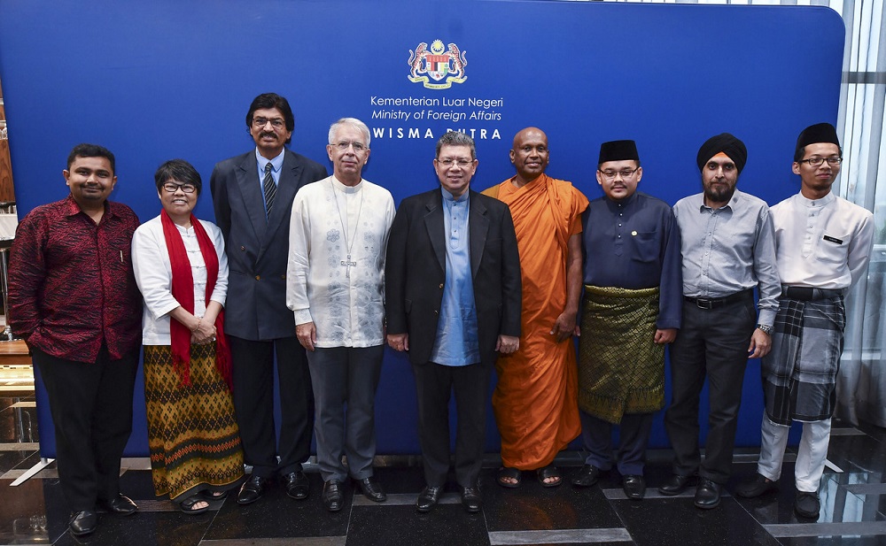 Foreign Minister Datuk Saifuddin Abdullah with the Friendship Group of Inter-Religious Services during the Farewell Hi-Tea for the Holy See Ambassador to Malaysia, Joseph Marino (four from left) at Wisma Putra November 15, 2019. u00e2u20acu201d Bernama pic