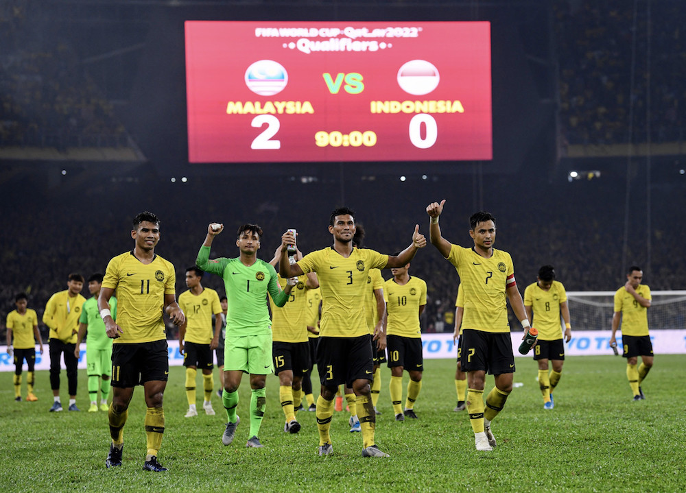 The Malaysia team celebrates after winning the Qatar 2022 Fifa World Cup qualifying match with Indonesia at Bukit Jalil Stadium November 19, 2019. — Bernama pic