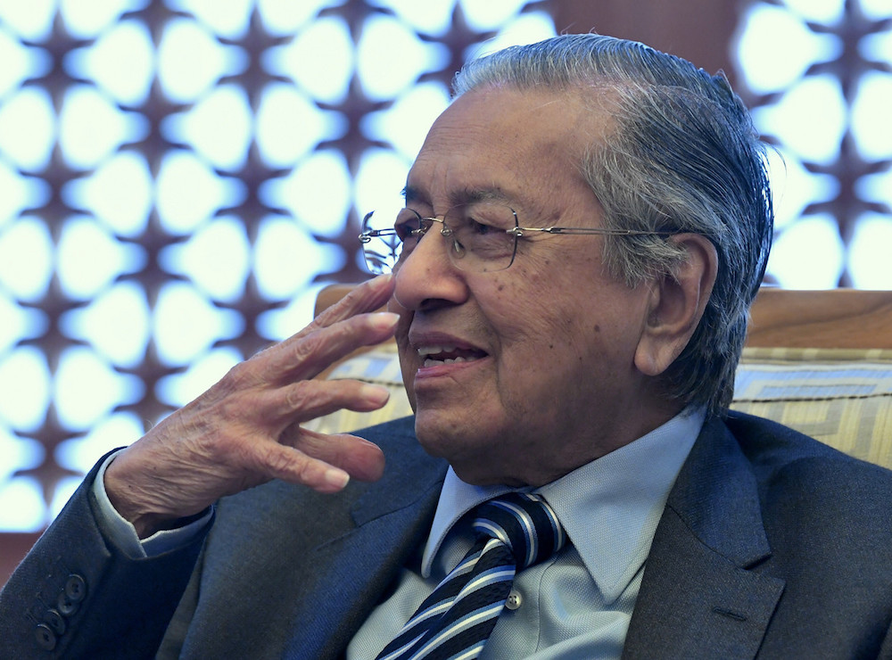 Prime Minister Tun Dr Mahathir Mohamad answers questions during a press conference with the Malaysian media in conjunction with his official two-day visit to Seoul on November 28, 2019. u00e2u20acu201d Bernama pic