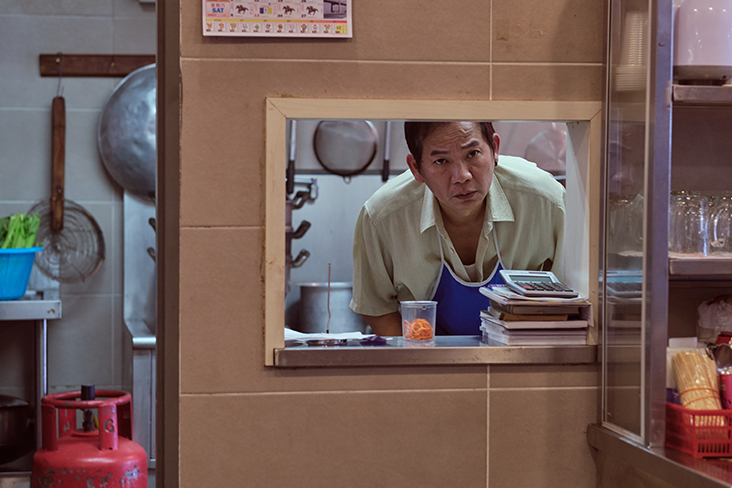 Wilson Tin's character in 'Stray Dogs' is a gangster turned chef.