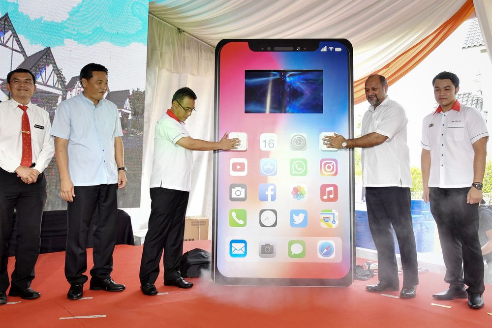 Communications and Multimedia Minister Gobind Singh Deo (second right) with Melaka Chief Minister Adly Zahari (third left) launching the Anjung Gapam Digital House, near Ayer Keroh, November 16, 2019. u00e2u20acu201d Bernama pic