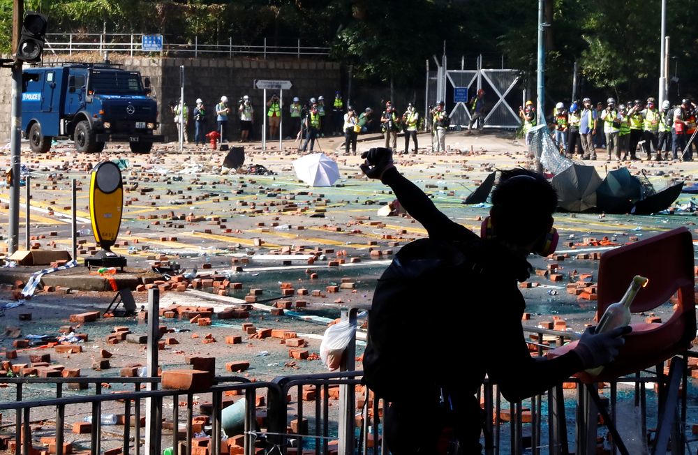 A protester throws a Molotov cocktail during clashes with police outside Hong Kong Polytechnic University (PolyU) in Hong Kong, China November 17, 2019. u00e2u20acu201d Reuters pic
