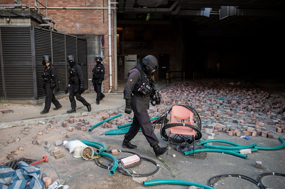 E.O.D (Explosive Ordnance Disposal) of the Hong Kong police arrive to search for any remaining protesters hiding, dangerous explosives and chemicals at the Hong Kong Polytechnic University in the Hung Hom district of Hong Kong November 28, 2019. u00e2u20acu2022 AFP p
