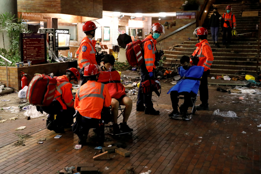 Protesters are taken outside Hong Kong Polytechnic University (PolyU) campus to receive medical aid, in Hong Kong, November 19, 2019. u00e2u20acu201d Reuters pic 