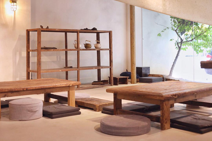 The spare, minimalist tea room invites tea drinkers to stay in the moment.