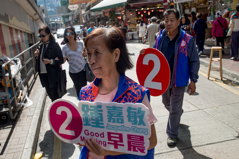 People campaign for Jacqueline Chung, a candidate in Sundayu00e2u20acu2122s district council elections in Hong Kong, China, November 23, 2019. u00e2u20acu201d Reuters picnn