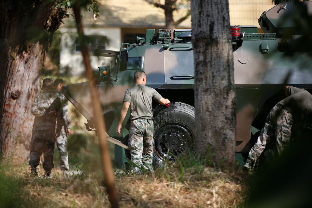 Peopleu00e2u20acu2122s  Liberation Army (PLA) vehicles and troops are seen inside the Tam Mei PLA base in Hong Kongu00e2u20acu2122s northern New Territories, China November 16, 2019. u00e2u20acu201d Reuters picnn