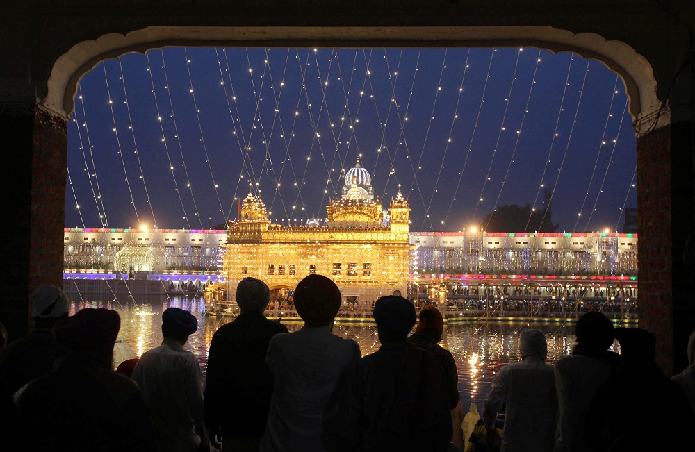 The Golden Temple is seen illuminated as Sikh devotees arrive on the eve of the 550th birth anniversary of Guru Nanak, the first Sikh Guru and founder of Sikh faith, in Amritsar, India November 11, 2019. u00e2u20acu201d Reuters pic