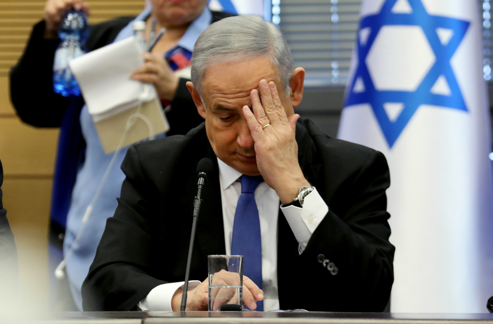 Israeli Prime Minister Benjamin Netanyahu gestures as he speaks during a meeting of the right-wing bloc at the Knesset (Israeli parliament) in Jerusalem November 20, 2019. u00e2u20acu201d AFP pic