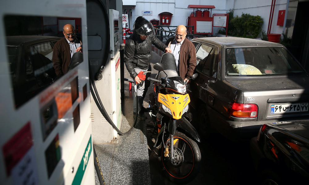 A man fills up his motorbikeu00e2u20acu2122s tank at a petrol station, after fuel price increased in Tehran, Iran November 15, 2019. u00e2u20acu201d Reuters pic