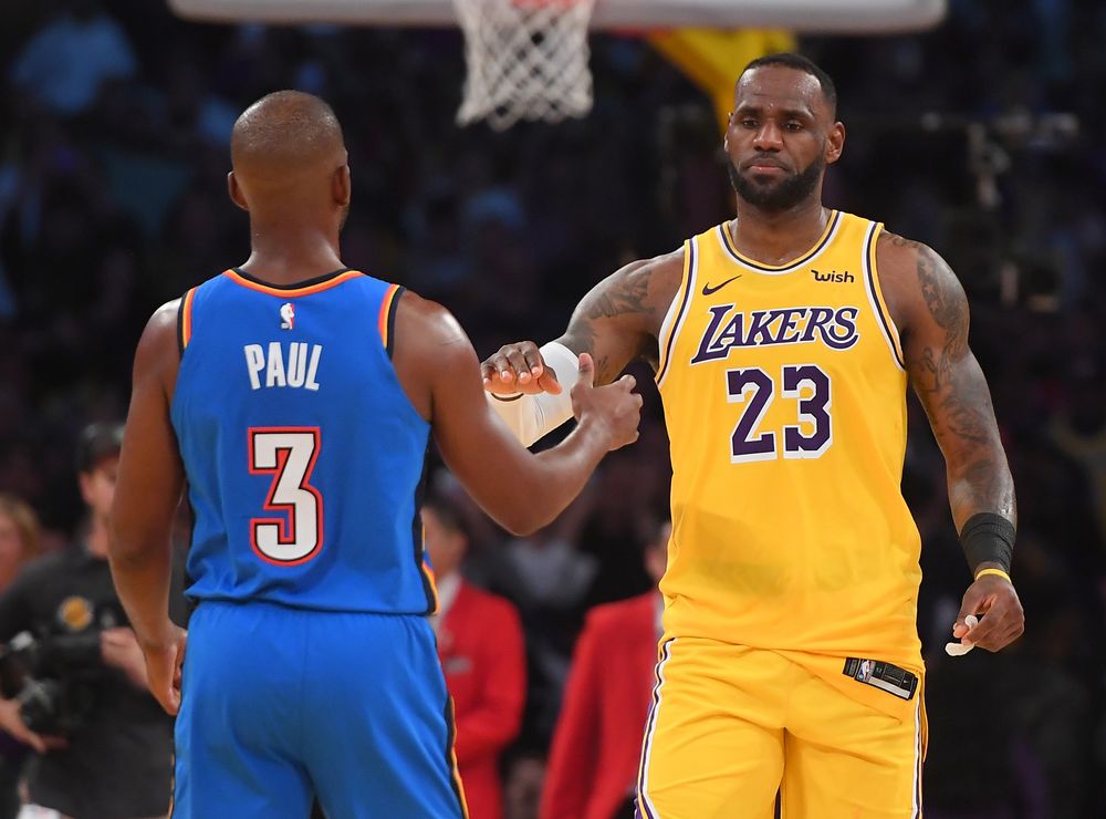 Los Angeles Lakers forward LeBron James (23) shakes hands with Oklahoma City Thunder guard Chris Paul (3) after the game at Staples Center Nov 19, 2019; Los Angeles. u00e2u20acu201d Jayne Kamin-Oncea-USA TODAY Sports pic via Reuters