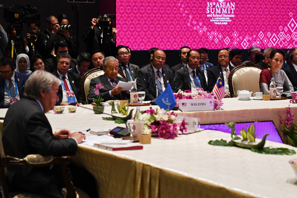 Malaysiau00e2u20acu2122s Prime Minister Tun Dr Mahathir Mohamad speaks as UN Secretary-General Antonio Guterres and Myanmaru00e2u20acu2122s State Counsellor Aung San Suu Kyi listen during the 10th Asean-UN Summit in Bangkok November 3, 2019. u00e2u20acu201d AFP pic 