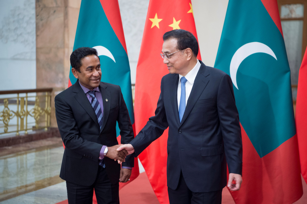 File picture of Chinese Premier Li Keqiang shaking hands with Maldives President Abdulla Yameen at the Great Hall of the People in Beijing, China December 7, 2017. u00e2u20acu201d Reuters pic 