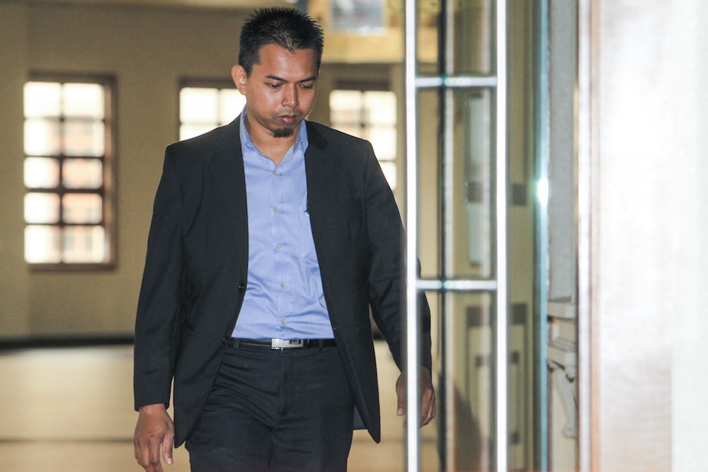 Companies Commission of Malaysia assistant registrar, Muhammad Akmaludin Abdullah, is pictured at the Kuala Lumpur Courts Complex November 18, 2019. u00e2u20acu201d Picture by Hari Anggara