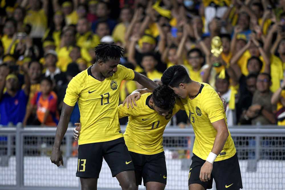Muhammad Safawi Rasid celebrates with teammates after scoring a goal against Indonesia in the 2022 World Cup/2023 Asian Cup qualifiers in Bukit Jalil November 19, 2019. u00e2u20acu2022 Bernama pic