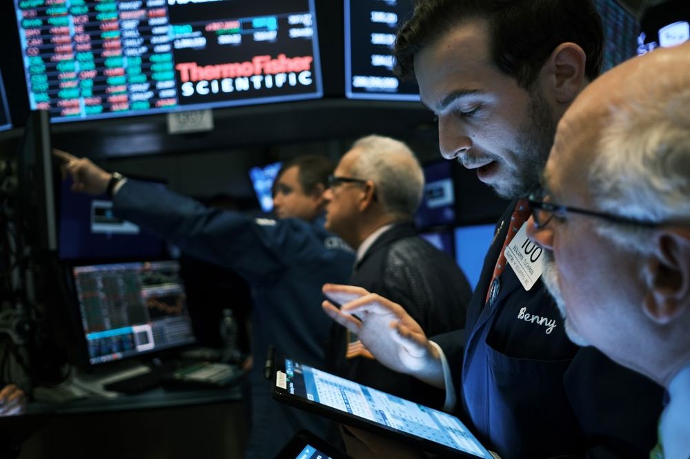 Traders work on the floor of the New York Stock Exchange (NYSE) on November 20, 2019 in New York City. u00e2u20acu201d AFP pic