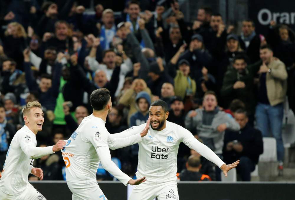 Olympique de Marseille's Nemanja Radonjic celebrates with Jordan Amavi and Valentin Rongier after scoring the second goal against Brest, November 29, 2019. u00e2u20acu2022 Reuters pic