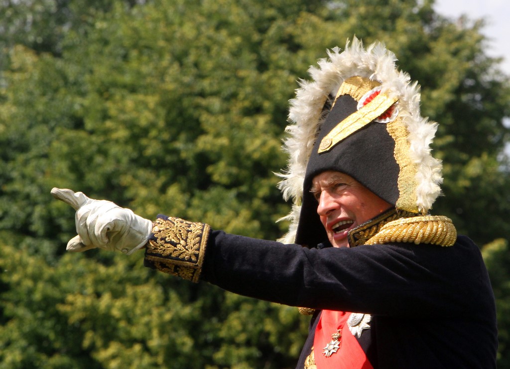 This file photo taken on June 23, 2012 shows Paris Sorbonne University's professor Oleg Sokolov giving orders to his troops, on the banks of the river Neman in Kaunas, central Lithuania, as he plays Napoleon Bonaparte. u00e2u20acu201d AFP picnn