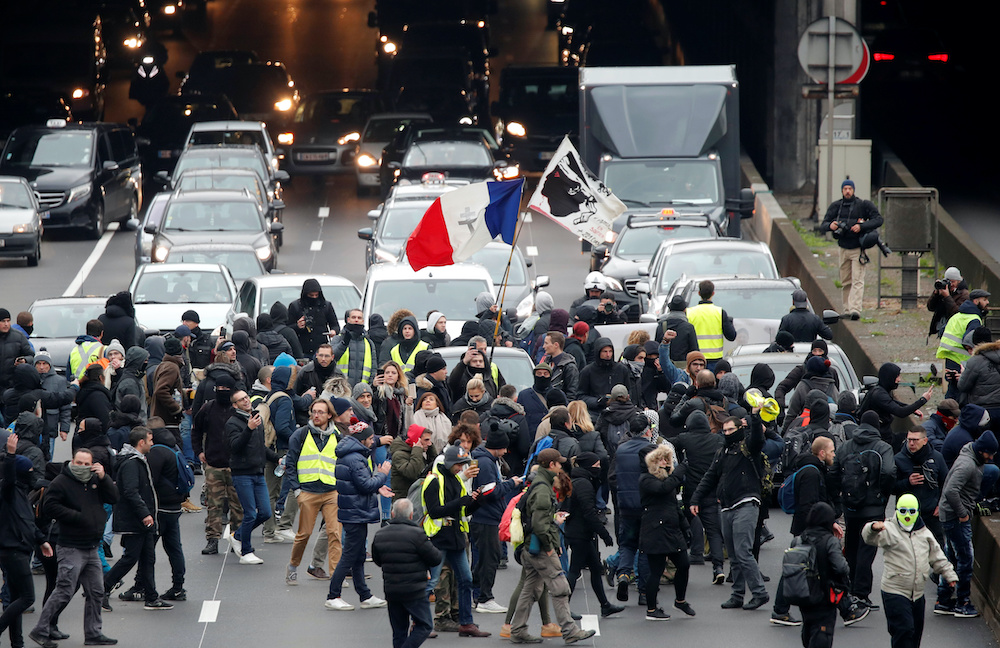 Protesters block the ring road during a demonstration to mark the first anniversary of the u00e2u20acu02dcyellow vestsu00e2u20acu2122 movement in Paris, France, November 16, 2019. u00e2u20acu201d Reuters picnn