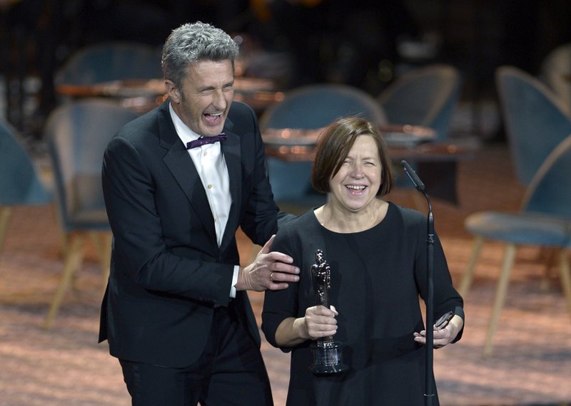 Director Pawel Pawlikowski (left) and producer Ewa Puszczynska with the European Film Awards Best Film trophy for 'Cold War'. u00e2u20acu2022 AFP pic