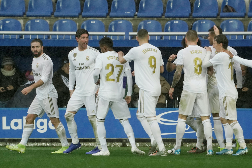 Real Madridu00e2u20acu2122s Dani Carvajal celebrates scoring their second goal with teammates during their match against Deportivo Alaves in Estadio Mendizorroza in Vitoria-Gasteiz, Spain, November 30, 2019. u00e2u20acu201d Reuters picnn