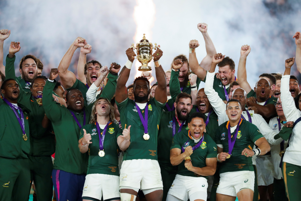 South Africau00e2u20acu2122s flanker Siya Kolisi (centre) lifts the Webb Ellis Cup as they celebrate winning the Japan 2019 Rugby World Cup final match between England and South Africa at the International Stadium Yokohama in Yokohama November 2, 2019. u00e2u20acu201d AFP pic