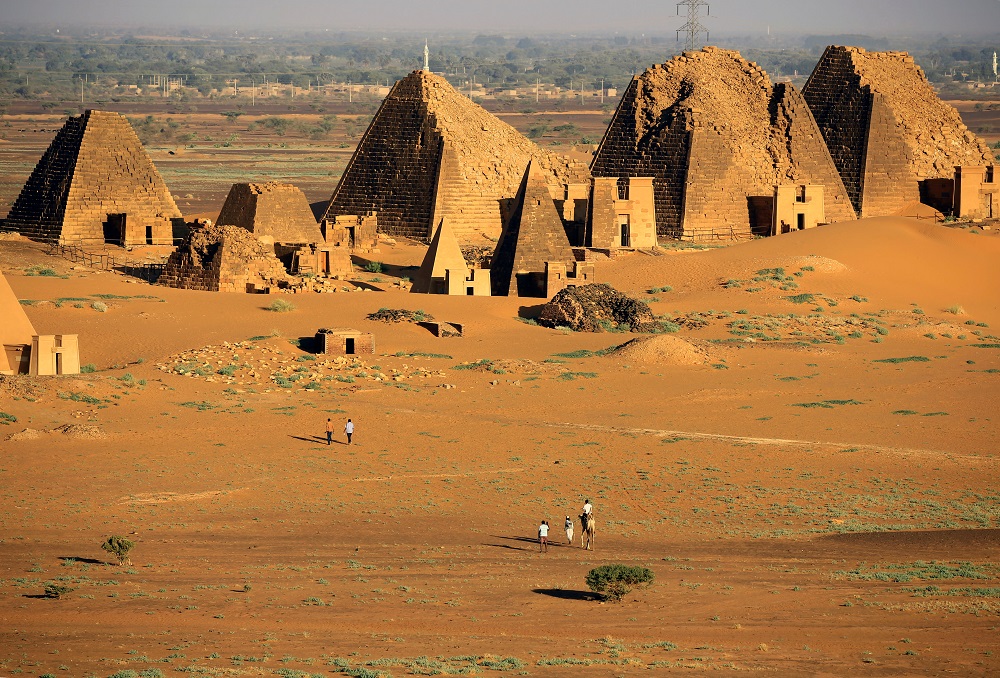 Tourists walk to the Royal Cemeteries of Meroe Pyramids in Begrawiya at River Nile State, Sudan November 10, 2019. u00e2u20acu201d Reuters pic 