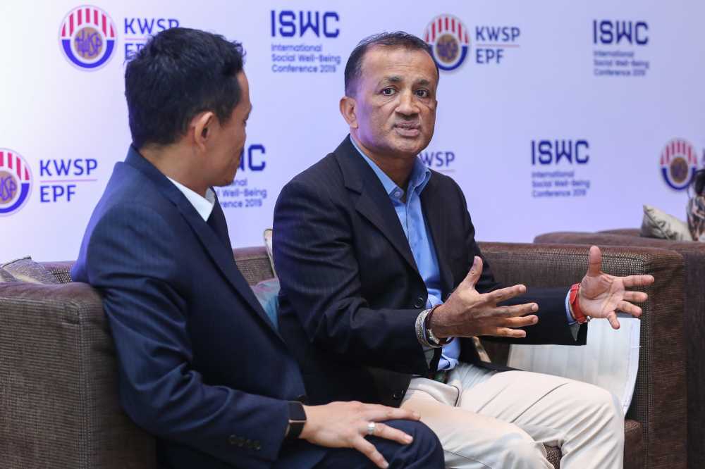 Founder of the Global Institute for Tomorrow Chandran Nair (right)  speaks during the 2019 International Social Well-Being Conference in Kuala Lumpur November 21, 2019. u00e2u20acu2022 Picture by Yusof Mat Isa