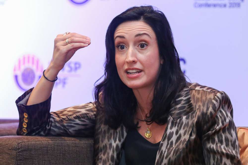 Erica Orange of Future Hunters speaks during the 2019 International Social Well-being Conference in Kuala Lumpur November 21, 2019.