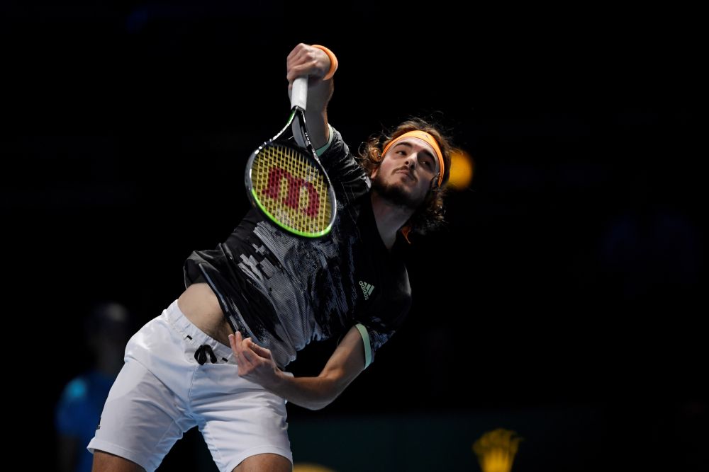 Greece's Stefanos Tsitsipas in action during his group stage match against Germany's Alexander Zverev. u00e2u20acu201d Reuters  pic