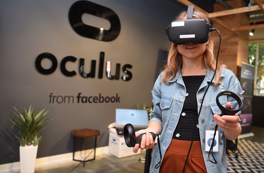Facebook employee Elza Uzmanoff tries out an Oculus device at the companyu00e2u20acu2122s corporate headquarters campus in Menlo Park, California October 23, 2019. u00e2u20acu201d AFP pic