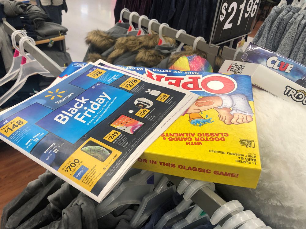 Black Friday ads lay on top of clothes during a sales event on Thanksgiving day at Walmart in Westbury, New York, US, November 28, 2019. u00e2u20acu201d Reuters pic