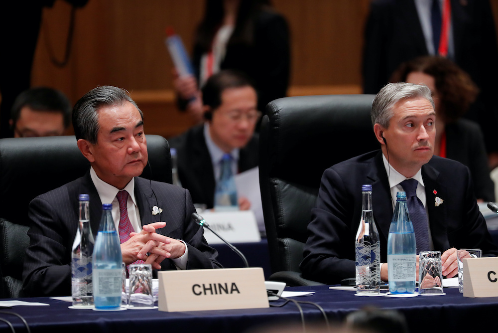 Chinau00e2u20acu2122s Foreign Minister Wang Yi and Canadau00e2u20acu2122s Foreign Minister Francois-Philippe Champagne attend the plenary session at the G20 Foreign Ministersu00e2u20acu2122 Meeting in Nagoya, Japan, November 23, 2019. u00e2u20acu201d Reuters picnn
